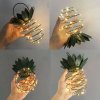 25 LED-es ananász formájú napelemes kültéri dekorációs lámpa